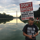 A Juggalo hangs out after the march.